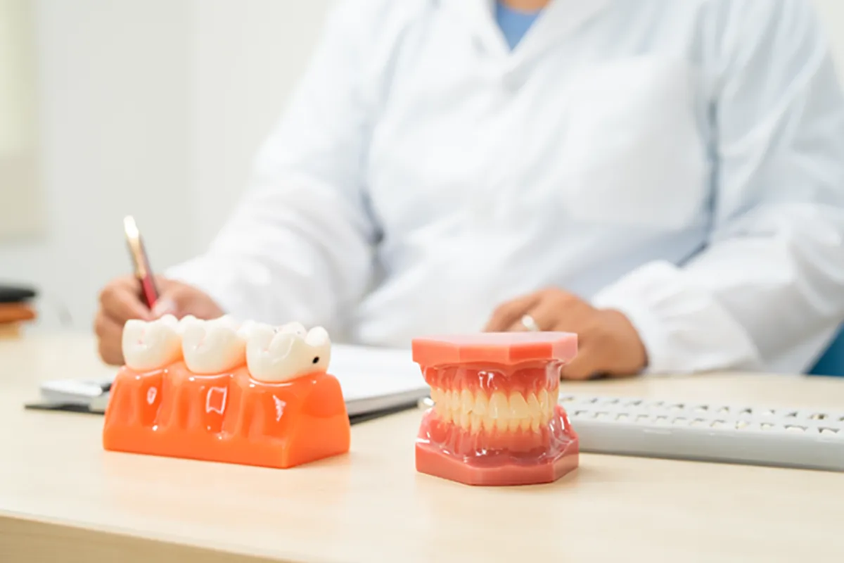 Dentist working at his desk