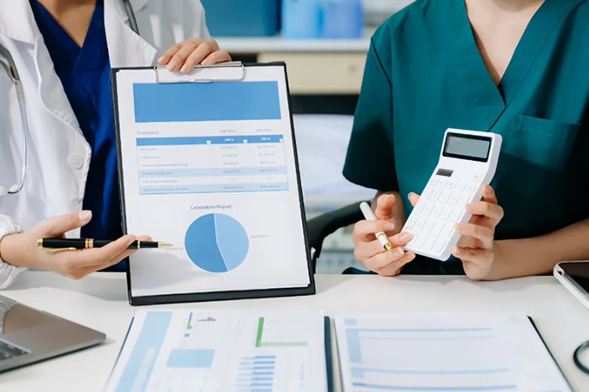 Dentist holding a Dental Credentialing Checklist