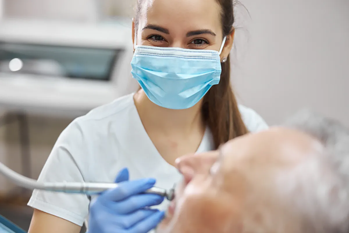 Female dentist working on a patient