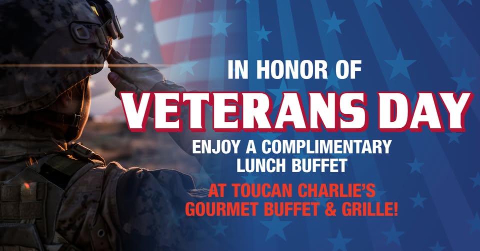**Alt Text Description:** A soldier in uniform salutes in front of a blurred American flag background. Overlaid patriotic text reads: “In honor of Veterans Day — Enjoy a complimentary lunch buffet at Toucan Charlie’s Gourmet Buffet & Grille!” The design features red, white, and blue colors with stars, evoking a sense of national pride and appreciation for veterans.