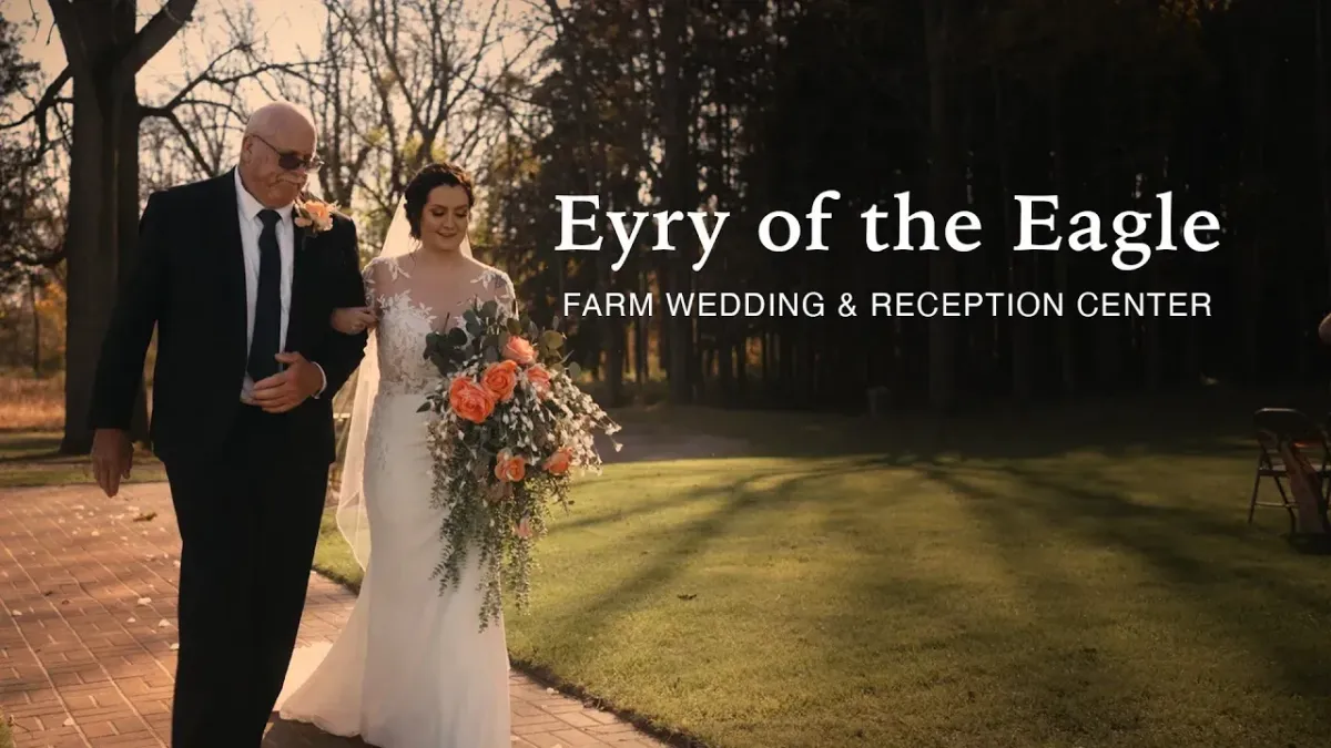 Iage of bride walking down an isle with her father outdoors