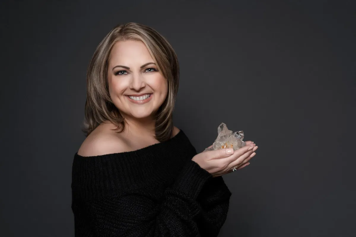 Kristen holding a quartz cluster