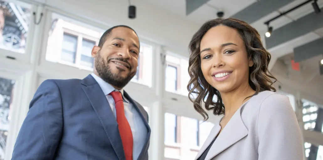 A man and woman in business attire