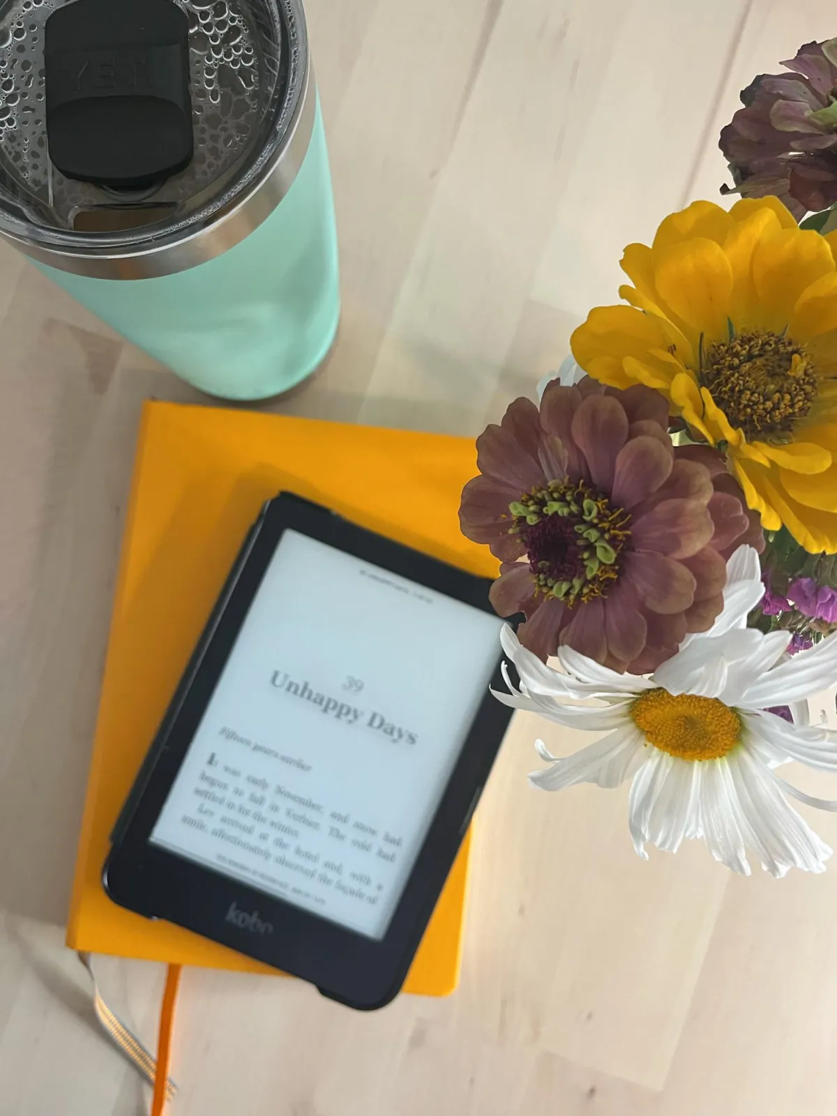 An inviting photo of a coffee and book