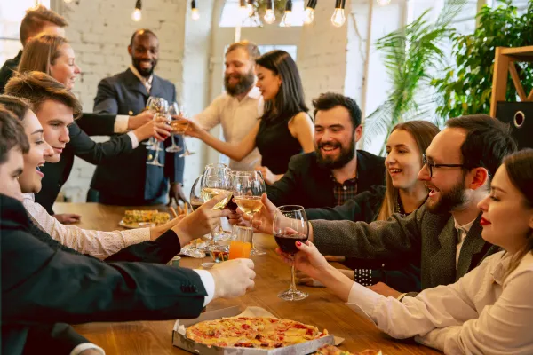 A group of coworkers celebrating at a corporate party
