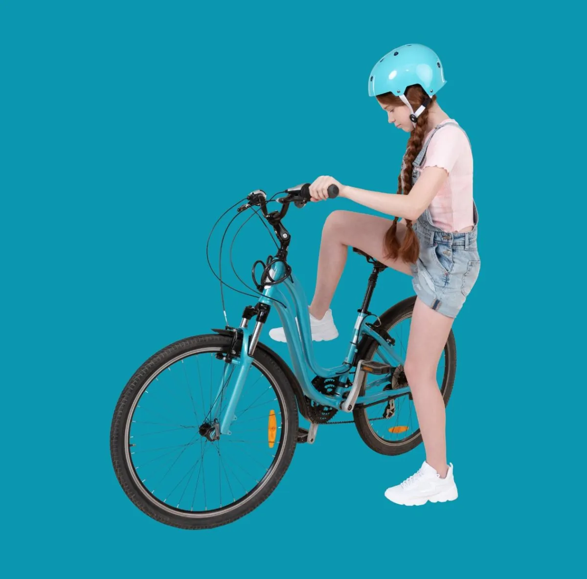 Girl getting on bike