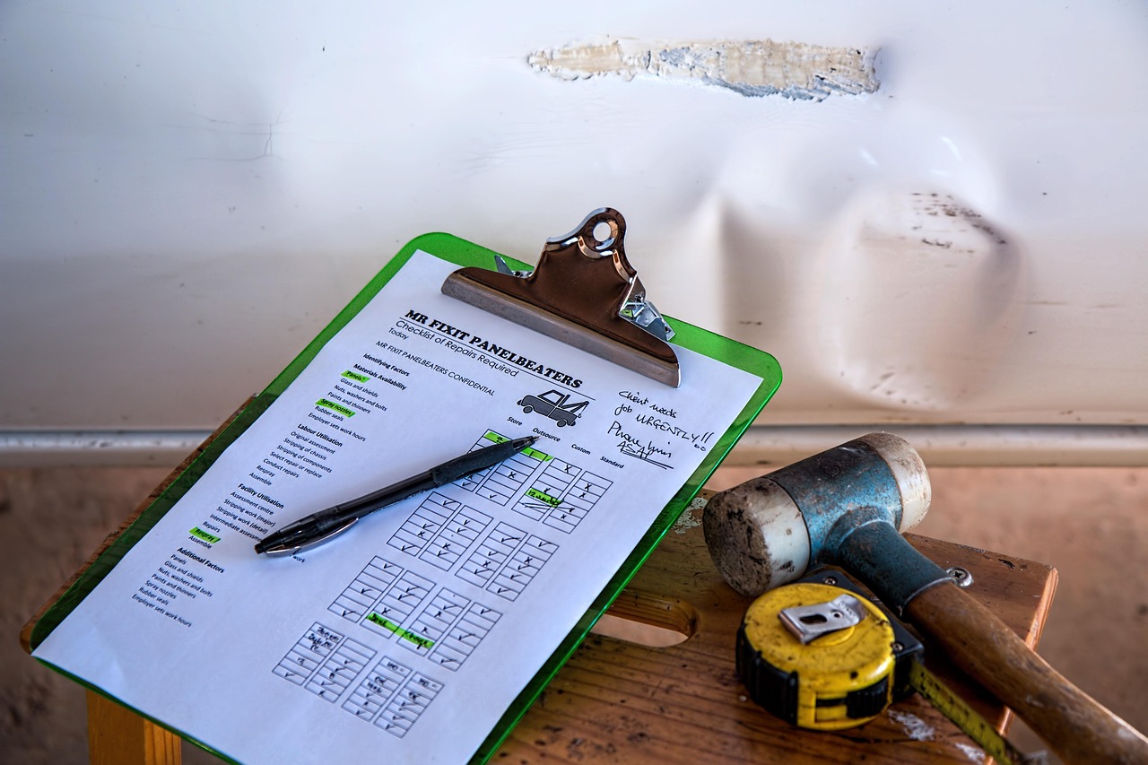 Danny, a U.S. military veteran and owner of D & D Home Inspections, standing in front of a home in Metairie, Louisiana, wearing a D & D branded shirt and holding an inspection checklist, representing a locally owned, veteran-operated home inspection company