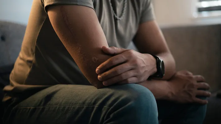 A man meeting with a therapist to represent Psychotherapy for Men