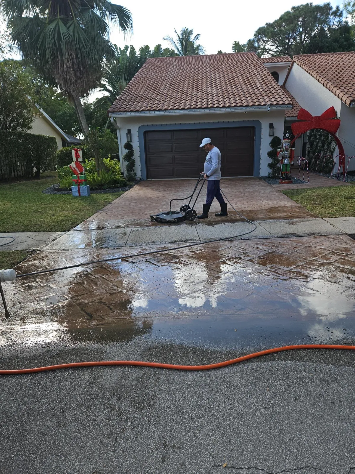 Man Pressure Washing in Parkland FL