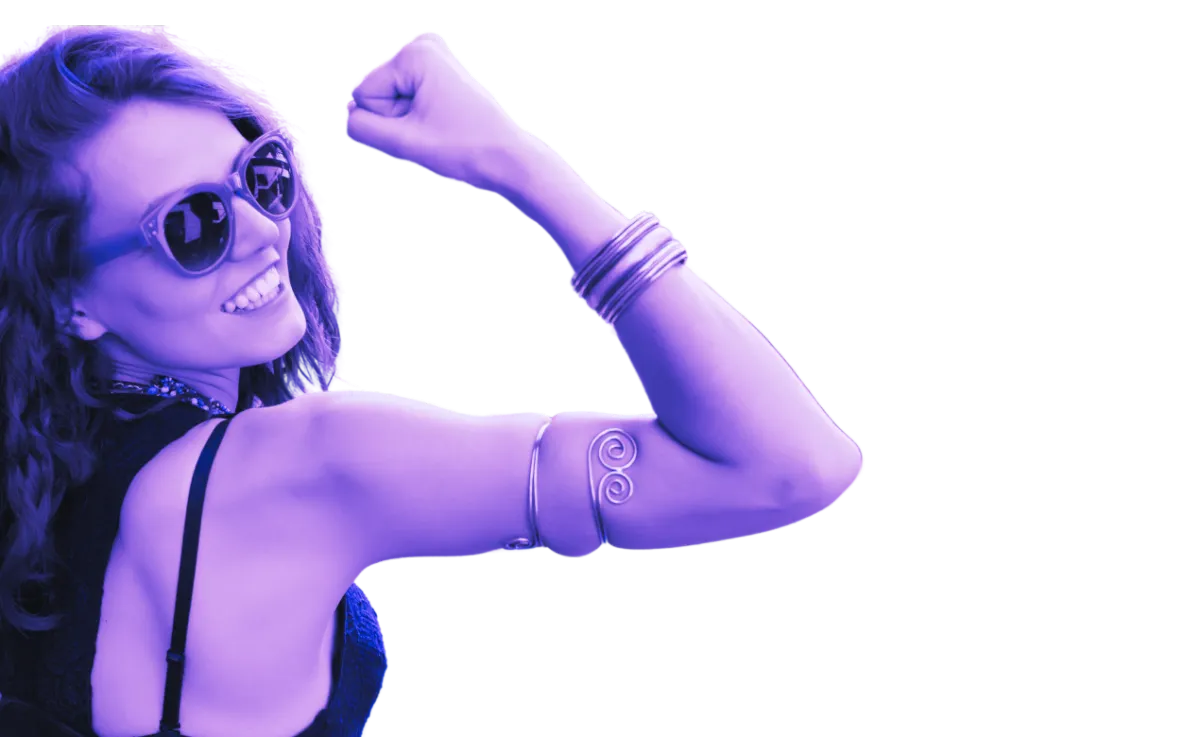 Woman raises her fist as a sign of strength