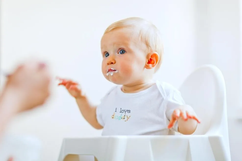 What Is Baby Reflux? Symptoms, Causes & When to Worry 
