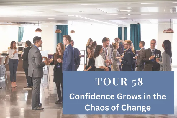 Business professionals networking at a conference reception, engaging in multiple conversations that represent the energy and opportunity of change.