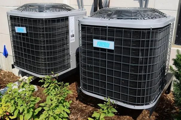 Two air conditioning units for a building.