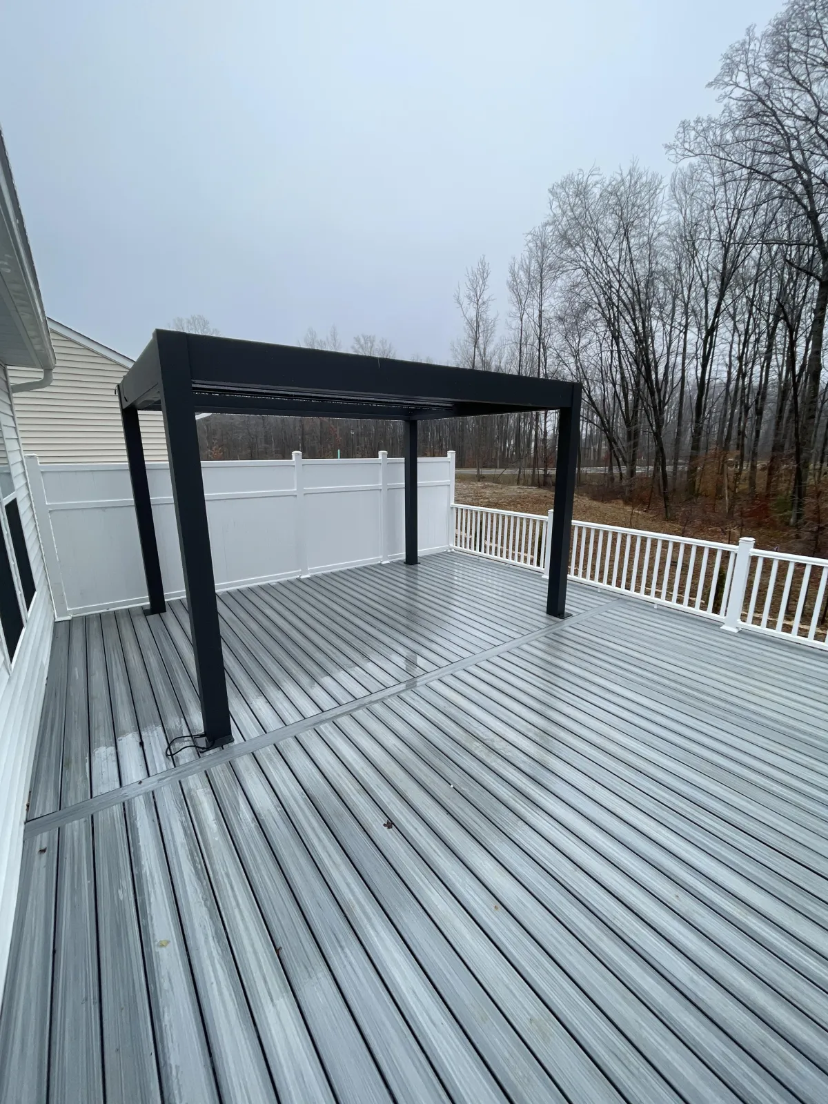 Black aluminum pergola on a grey composite deck - pergola installation by Prime Decks in Wilmington, DE