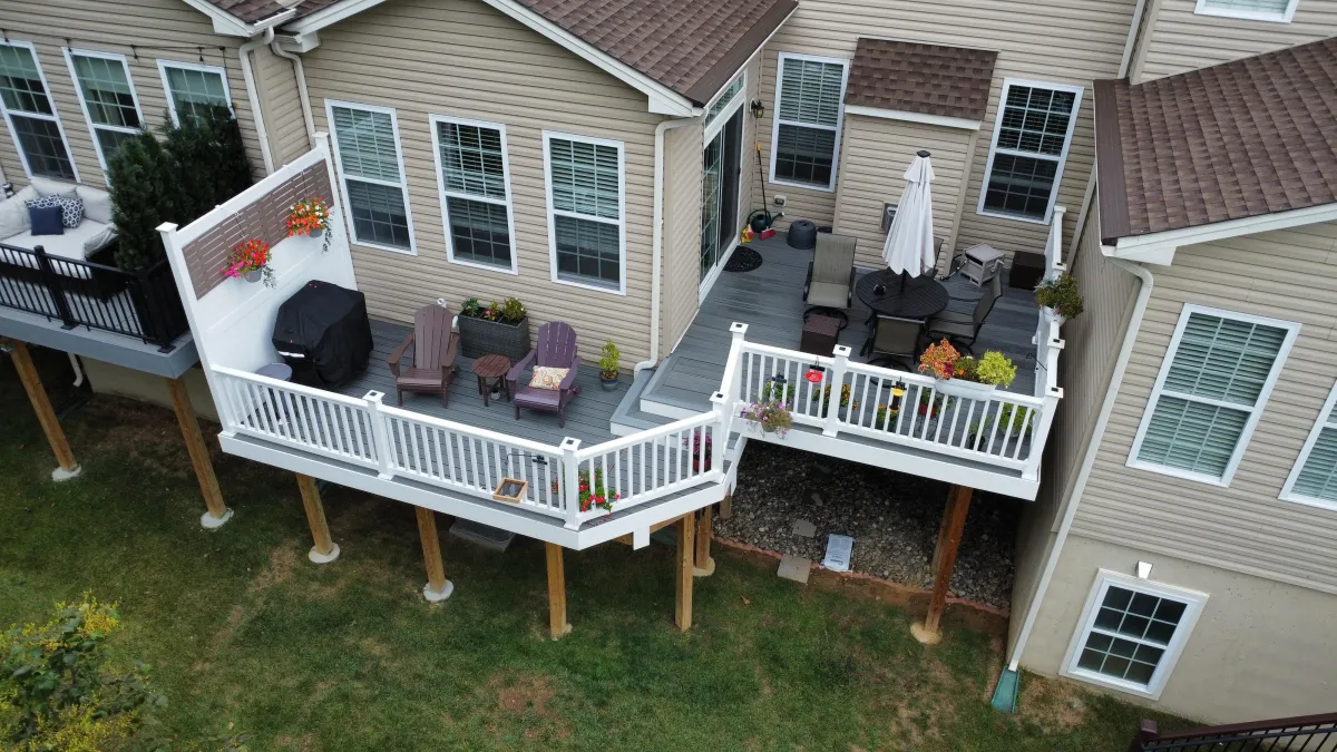 Aerial view of a composite deck with white railings and privacy screen - deck design by Prime Decks in Wilmington, DE