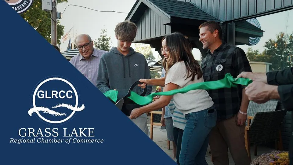 Matt Carrie and Family cutting Green Ribbon