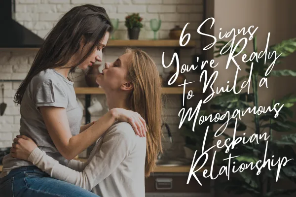 woman kissing her girlfriend at the kitchen