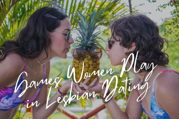 girlfriends taking a playful picture with a pineapple