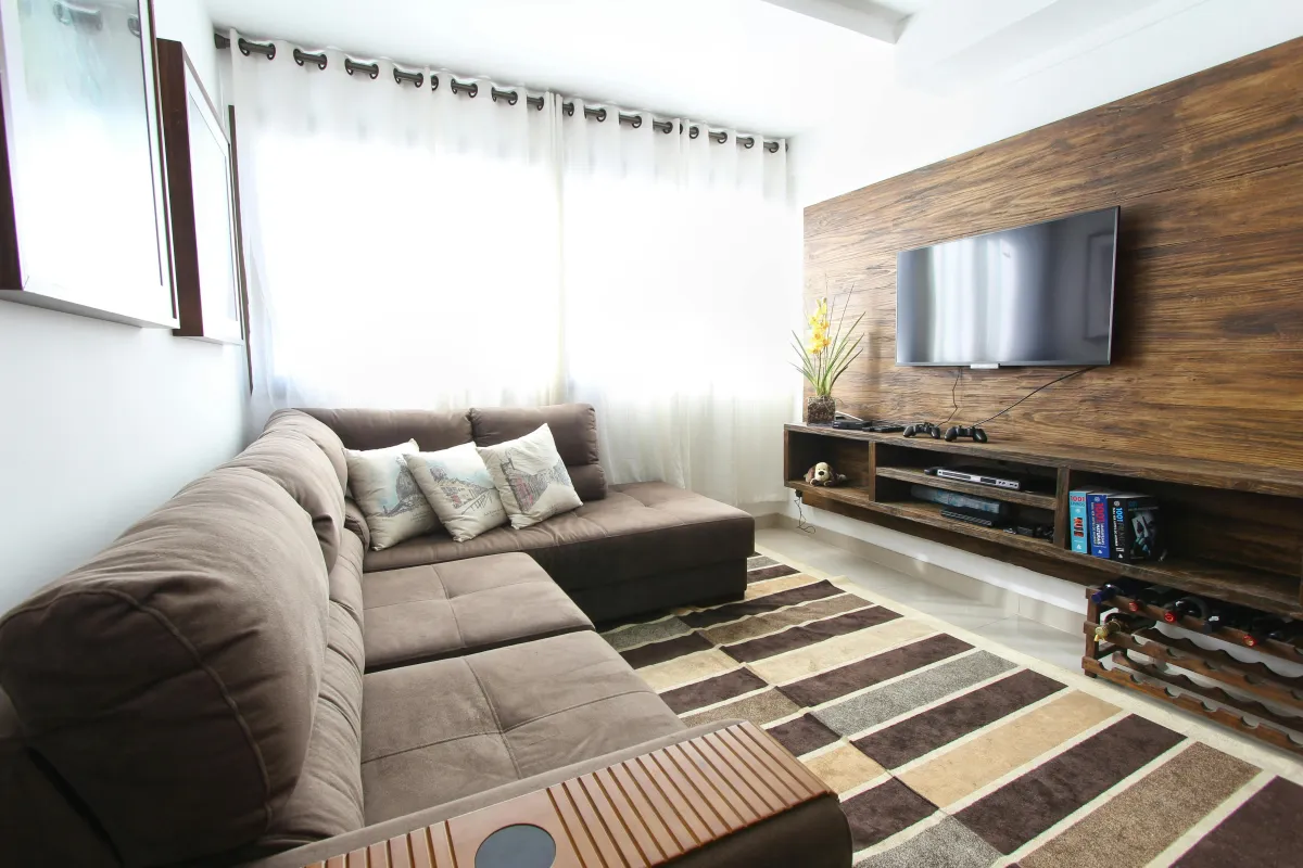 mounted tv on wood panelling 