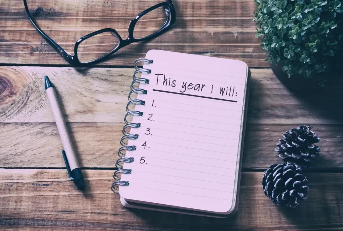 hypnosis- eyeglass, pen and notebook