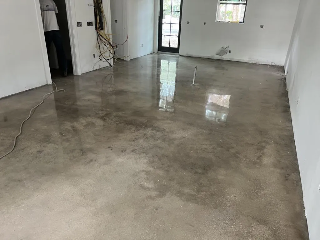 Polished Concrete or Clear Epoxy, both great choices