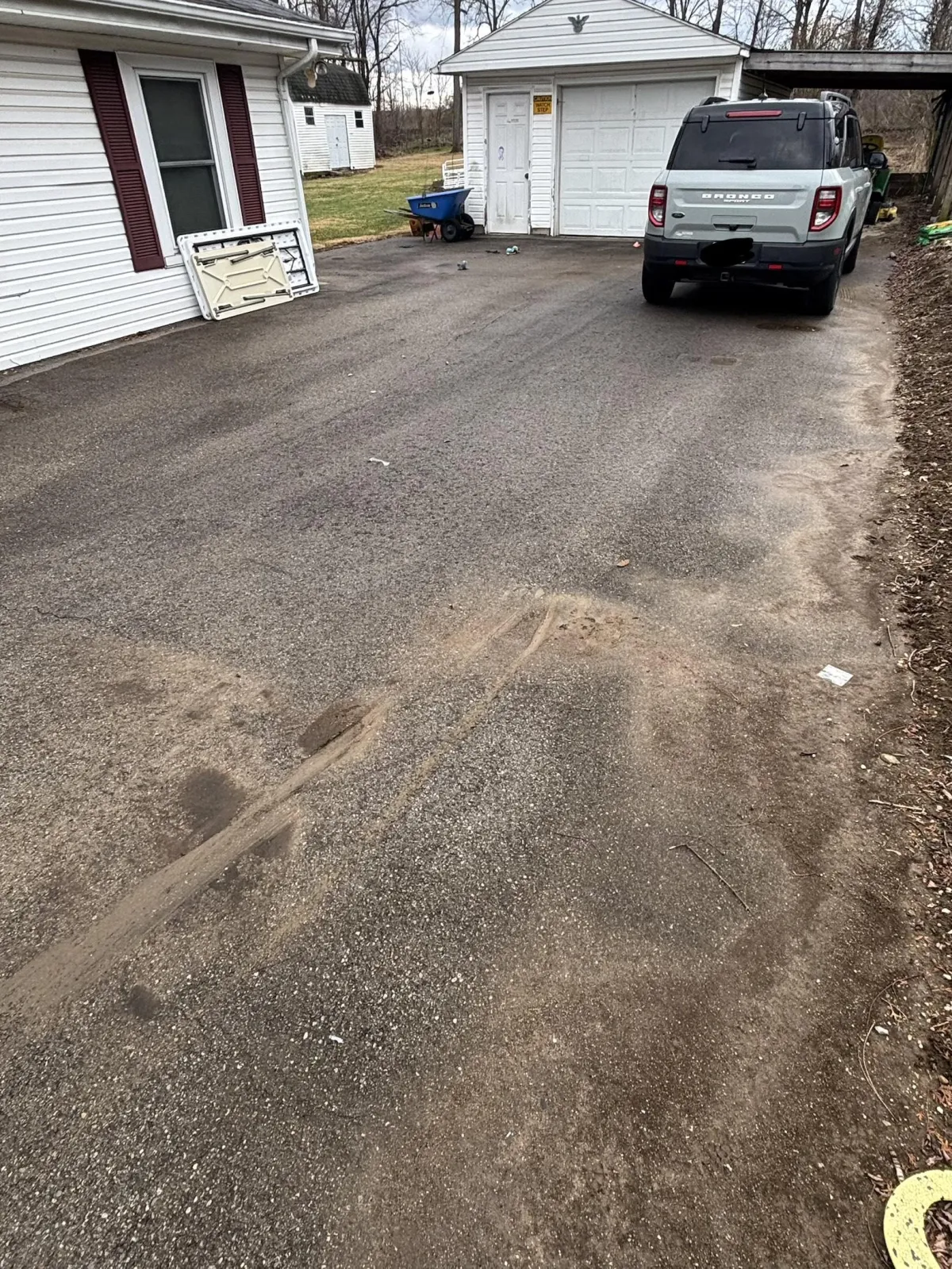 Empty driveway after curbside junk pickup in Dayton Ohio