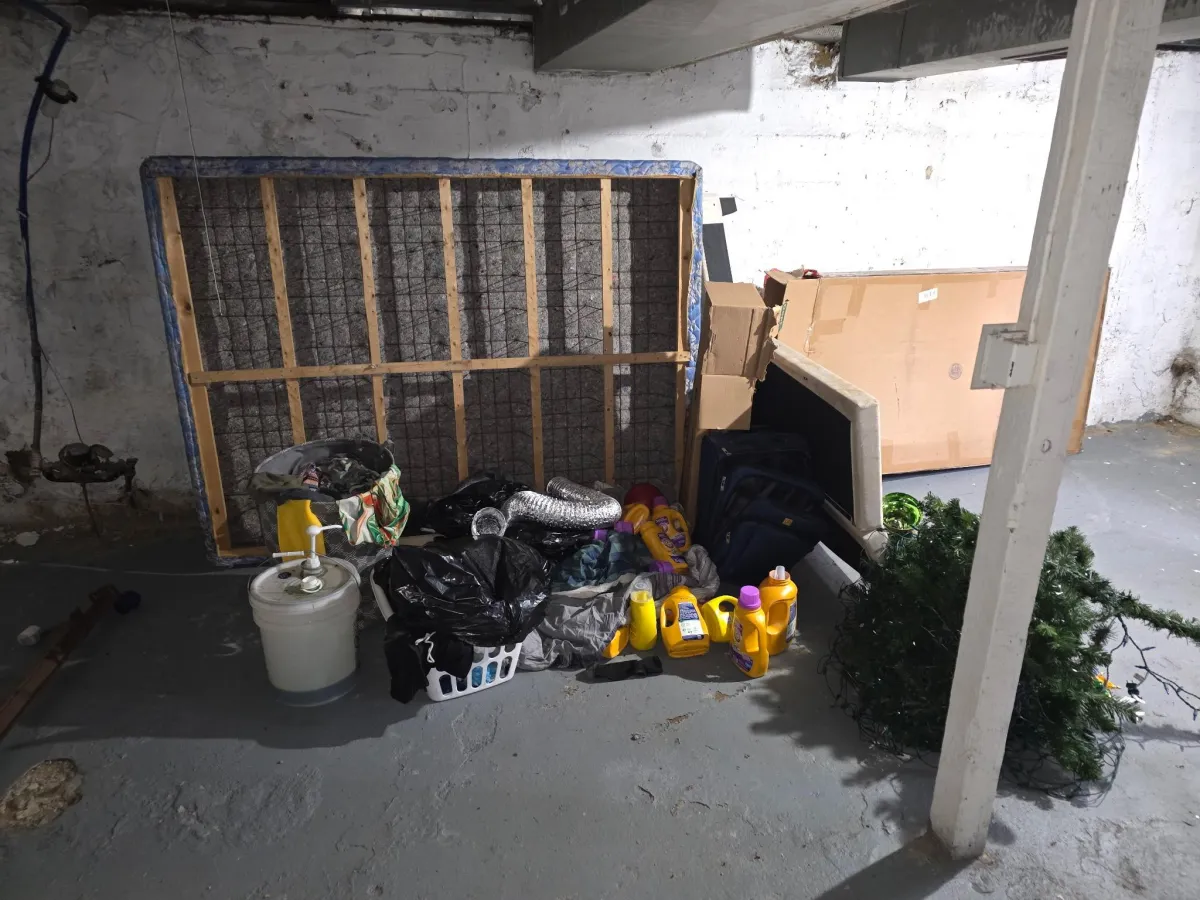 Basement full of junk before cleanout in Beavercreek Ohio