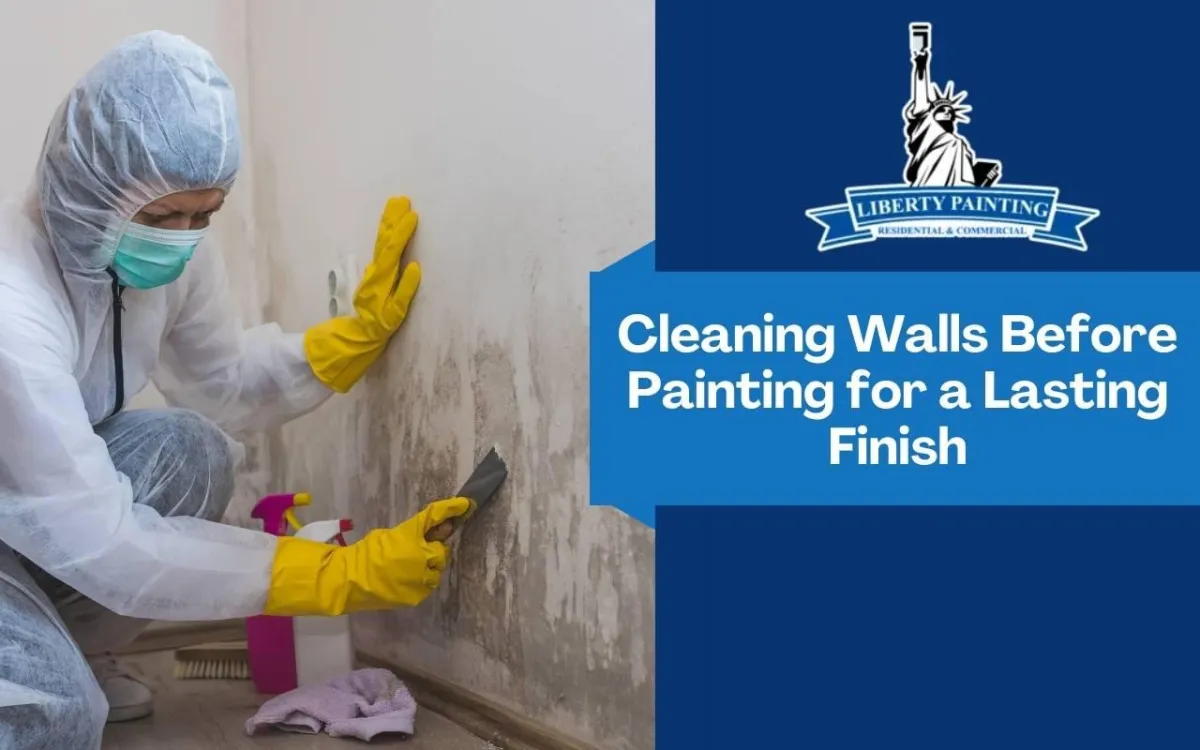 Person wiping a wall clean before painting a room