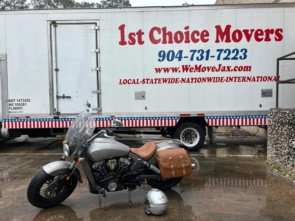1st Choice Movers truck on the road