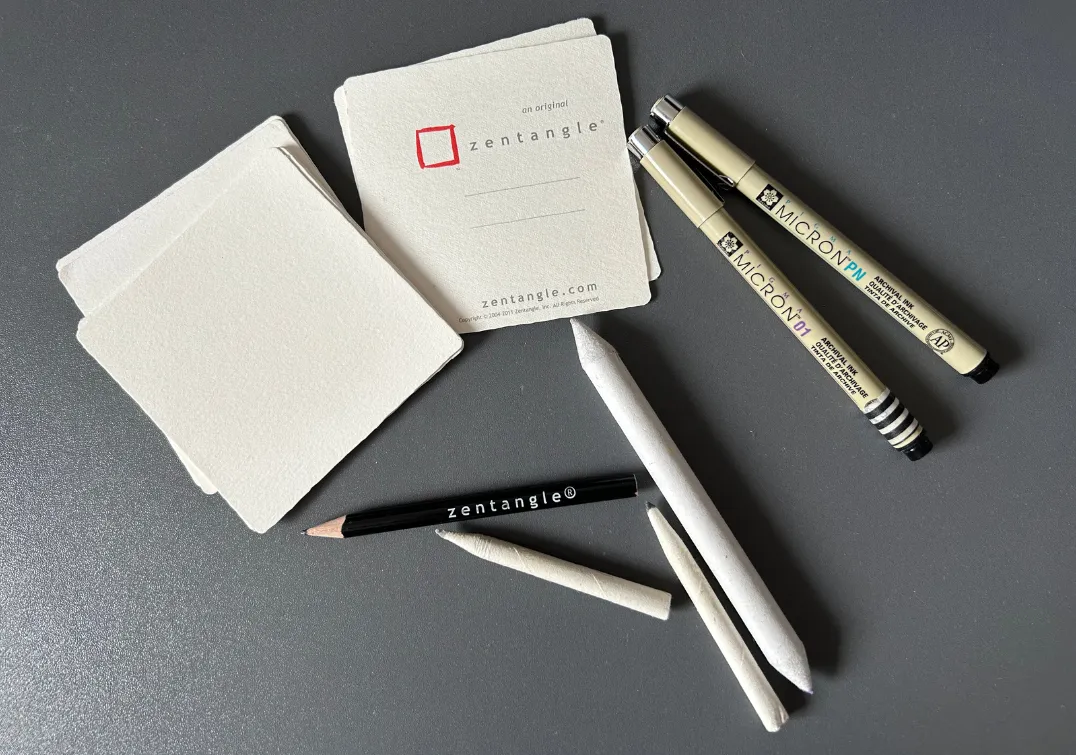 The basic supplies required for The Zentangle® Method - paper tiles, pen, pencil and blending stump