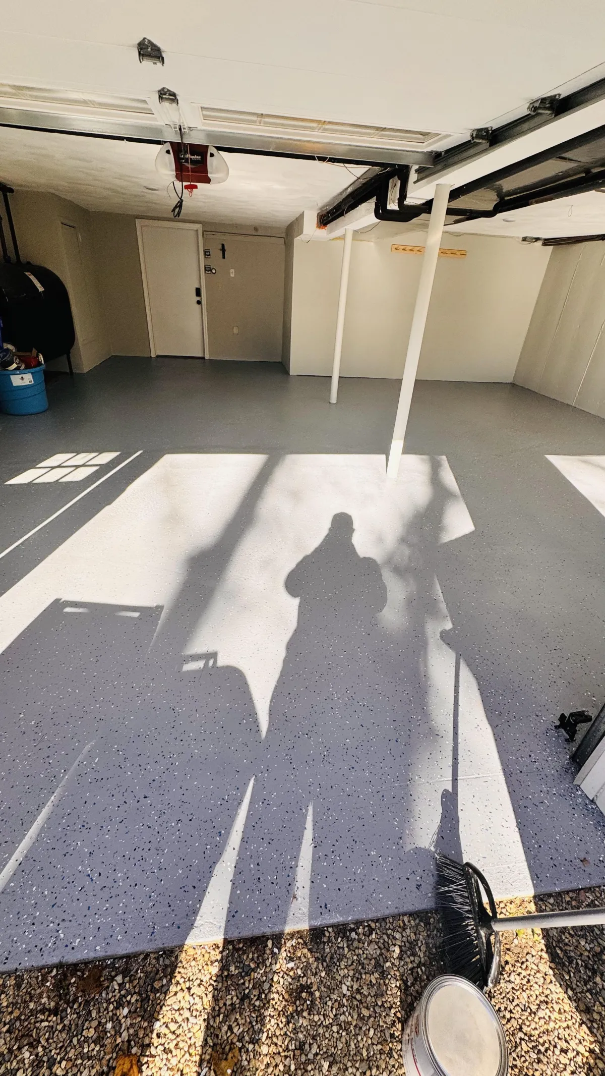 Basement painting service showing freshly painted walls and a clean, finished basement space in a Waltham, MA home