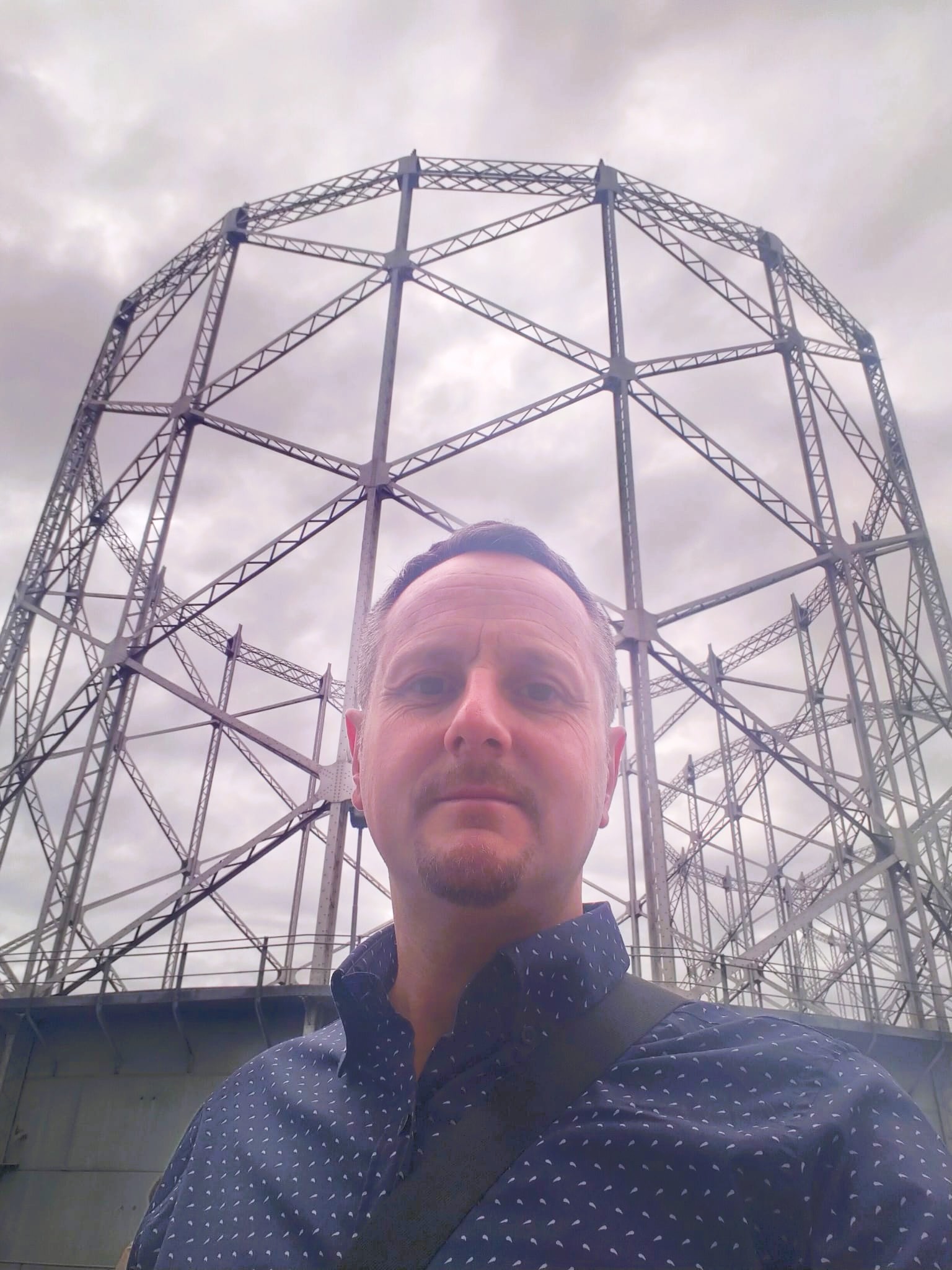 Author Daniele Ponzo looking businessy in a post industrial environment