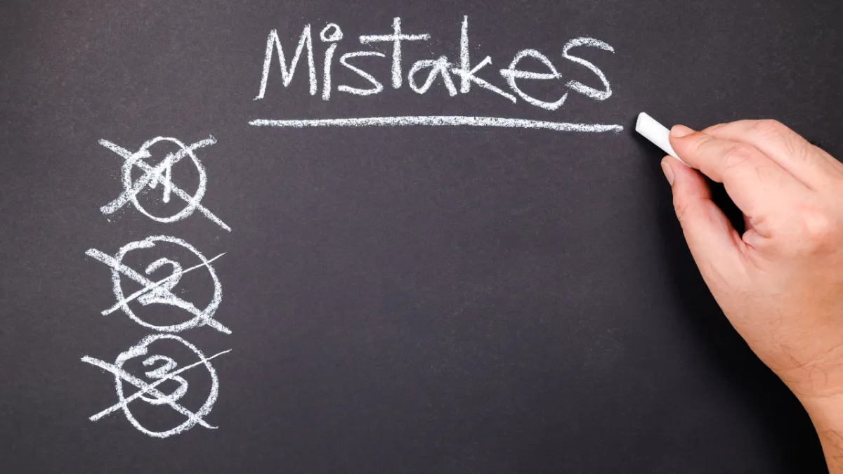 Student reviewing college application to avoid common mistakes