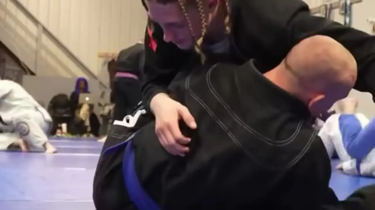 Students training Brazilian jiu-jitsu on the blue mats at Delta Grappling Academy in Heath, Ohio