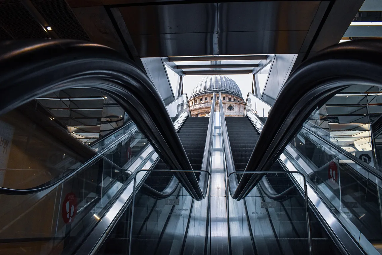 Escalators framing St Paul’s Cathedral, London