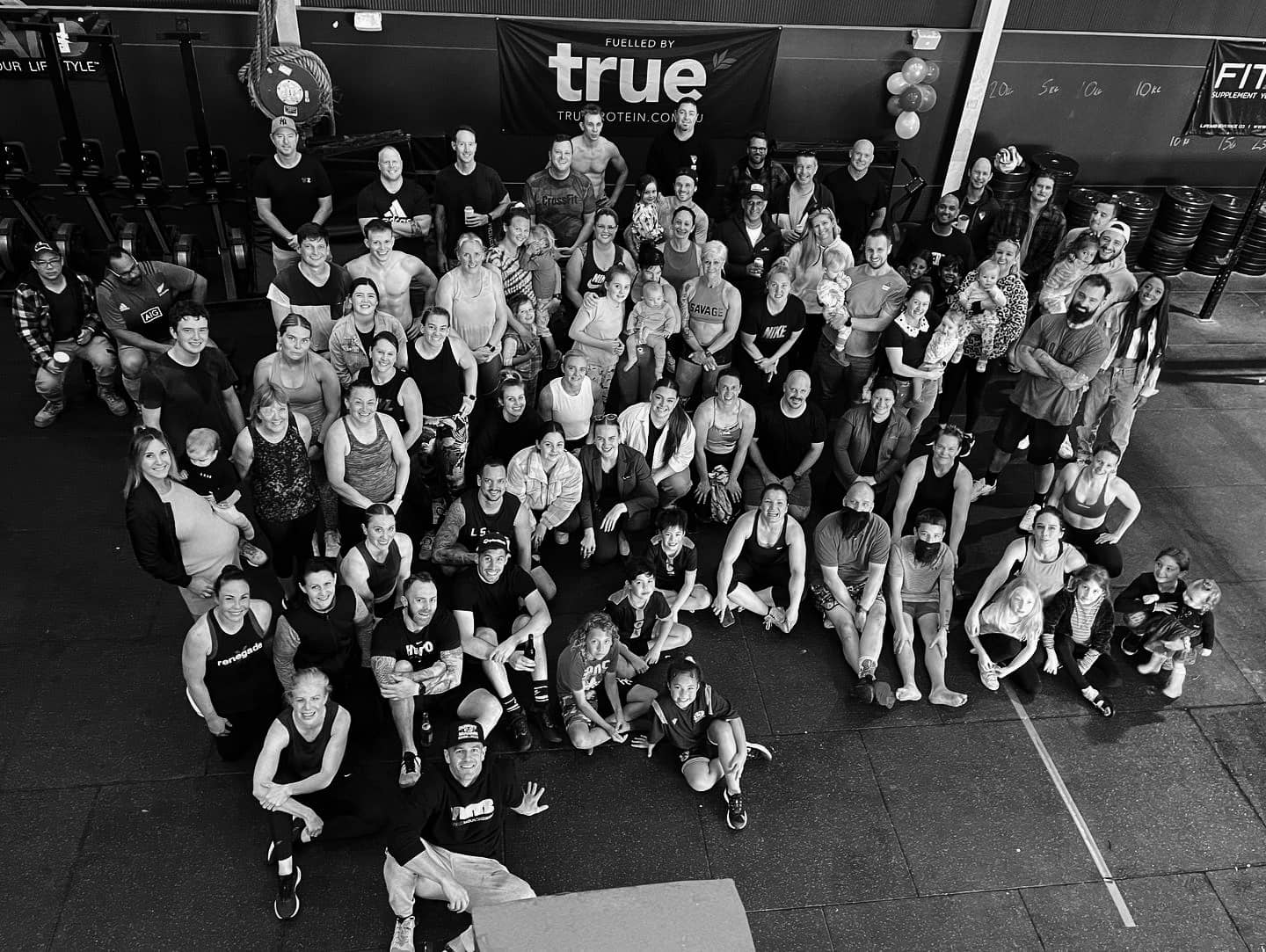 CrossFit Karuna members, coaches and families together at the gym