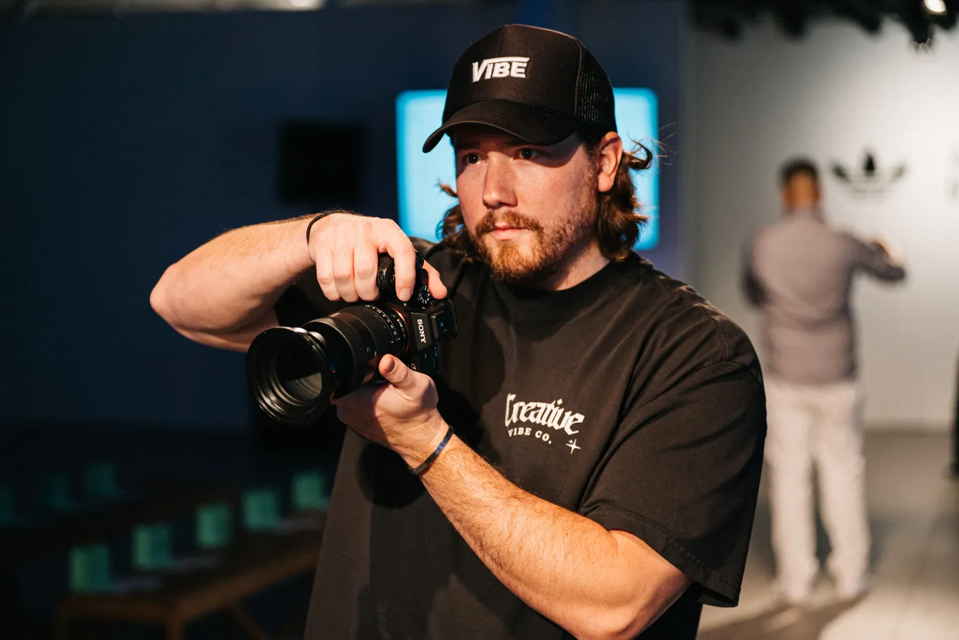 Creative Vibe camera operator shooting the runway