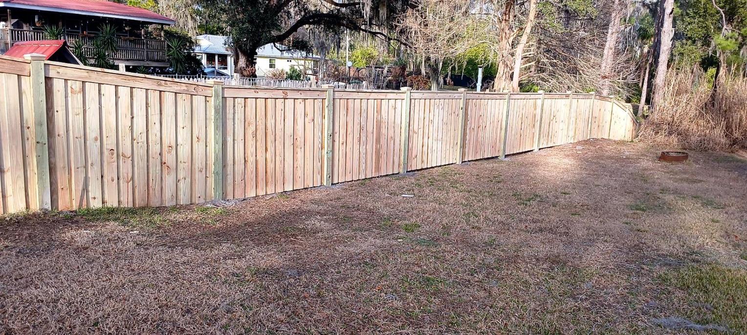Cap-and-trim wood privacy fence