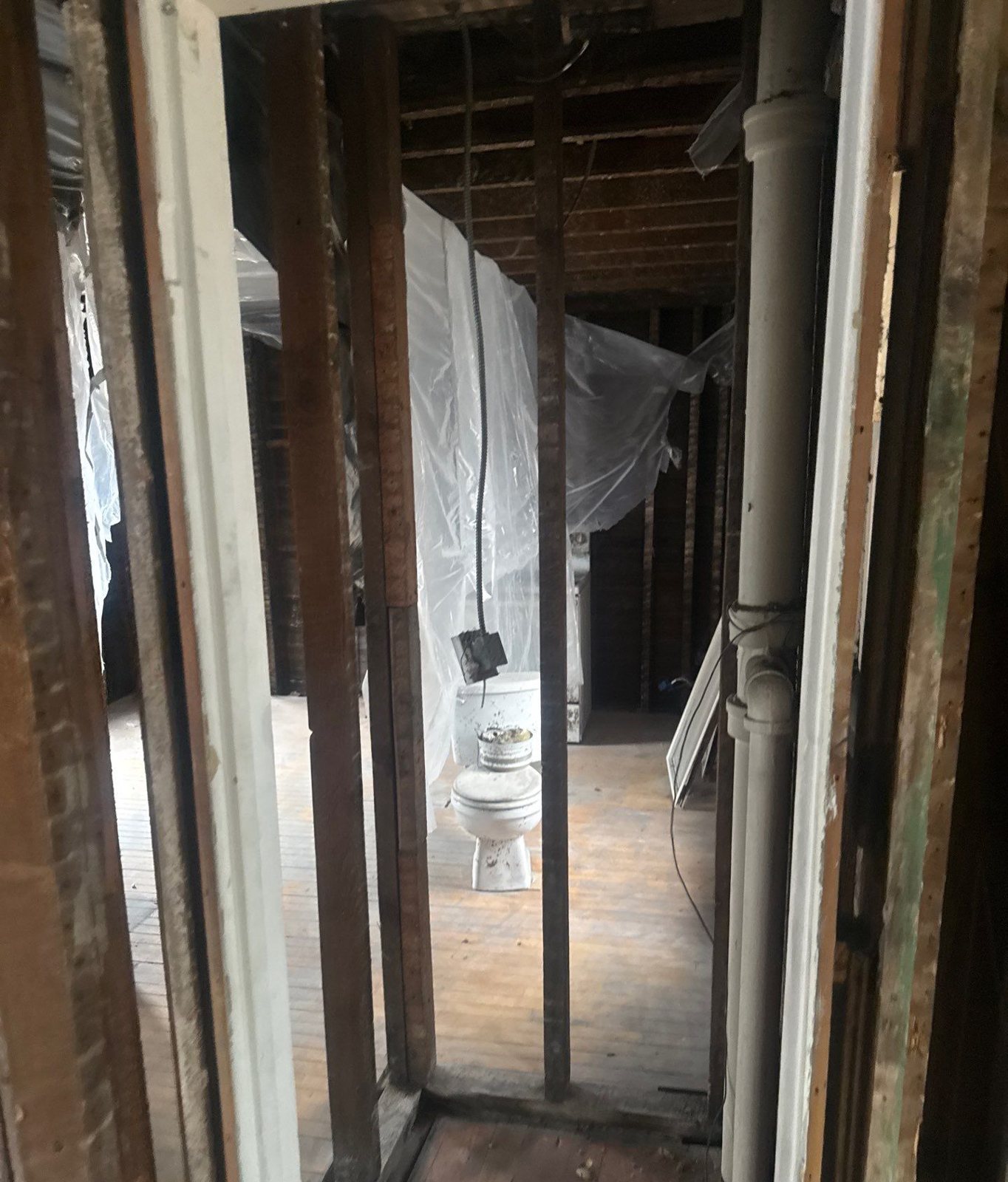 Interior walls opened down to the wood studs after moisture testing found wet assemblies