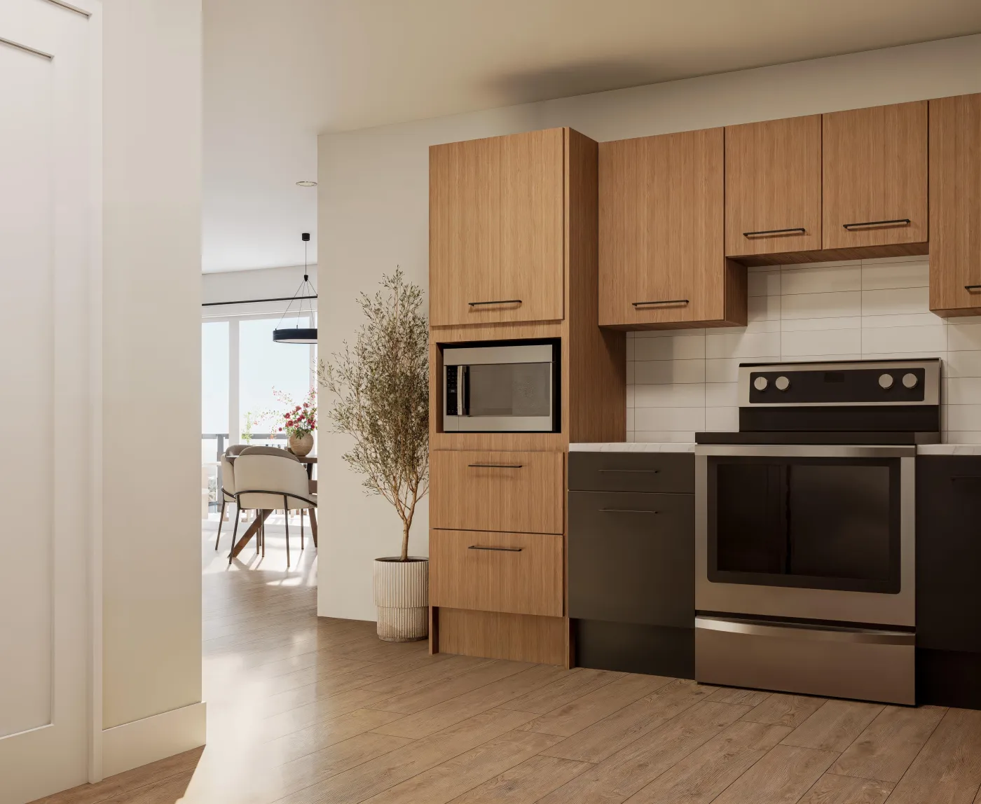 Kitchen wall with wood cabinetry and stainless range and microwave