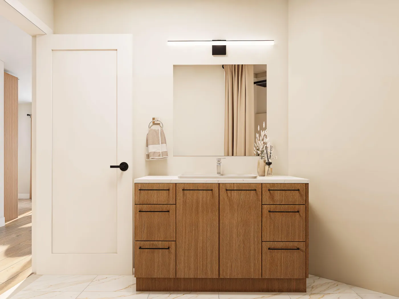 Bathroom vanity with wood drawers and a wide mirror