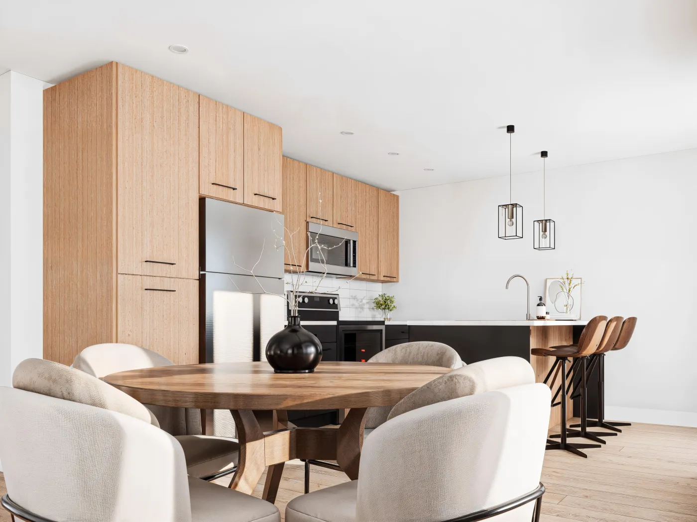 Dining area with a round wood table beside the kitchen