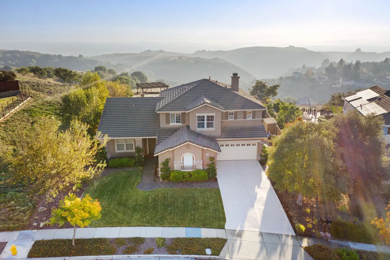 Aerial photograph of a hillside property