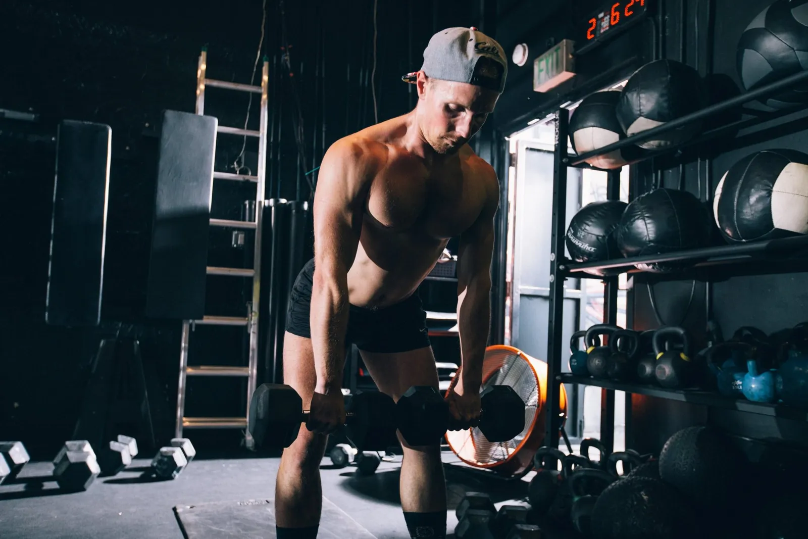 A member doing a dumbbell row