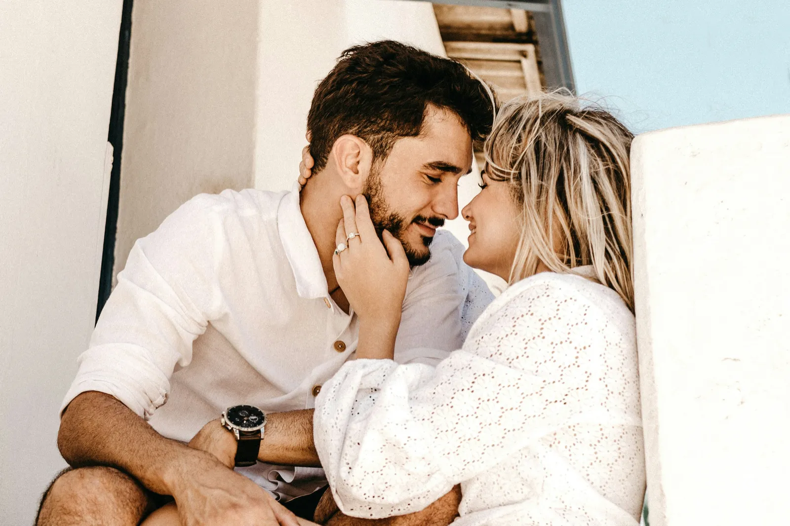 A couple about to kiss