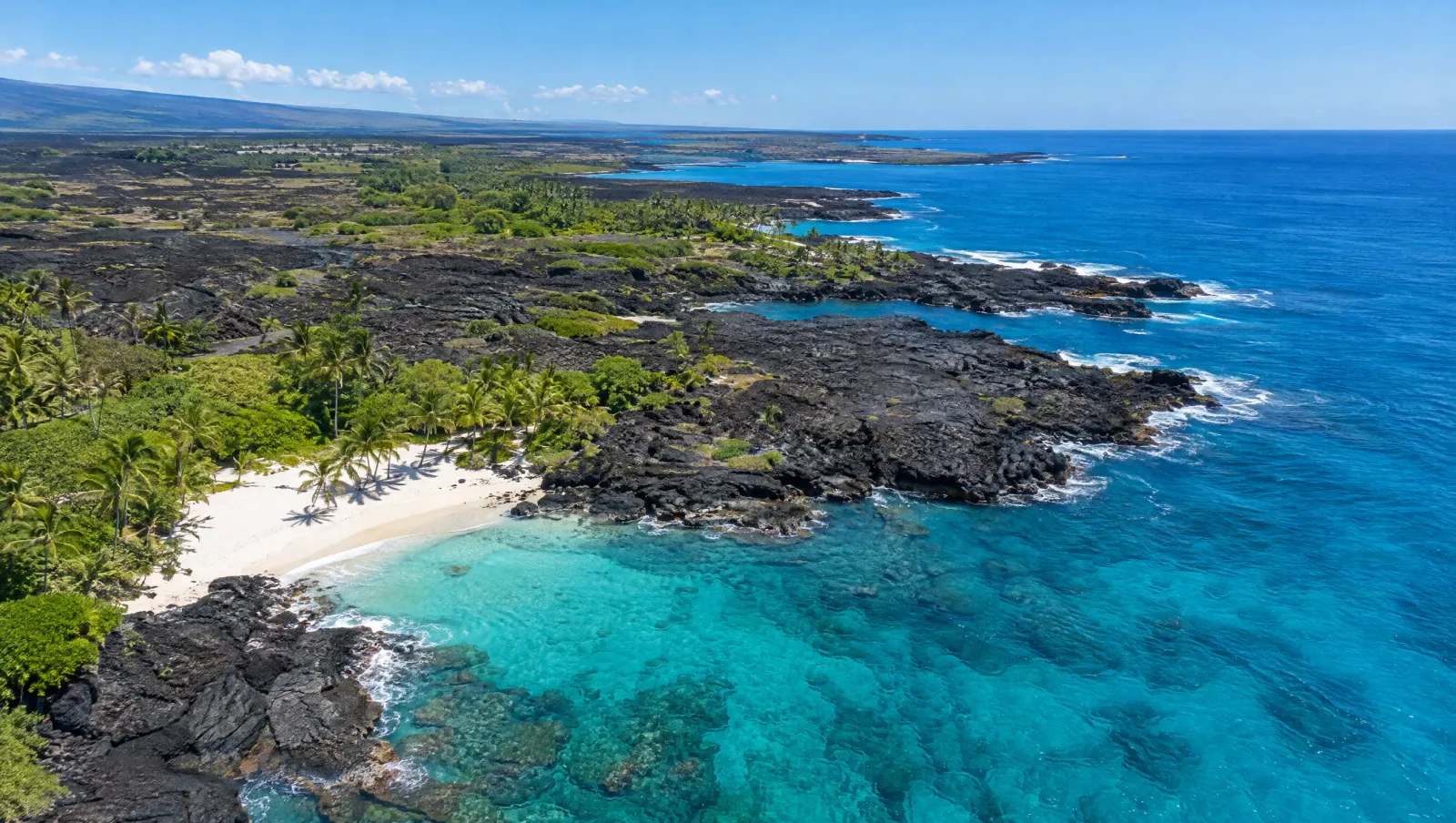 Black lava shoreline and turquoise water on the Kona coast, Hawaiʻi Island
