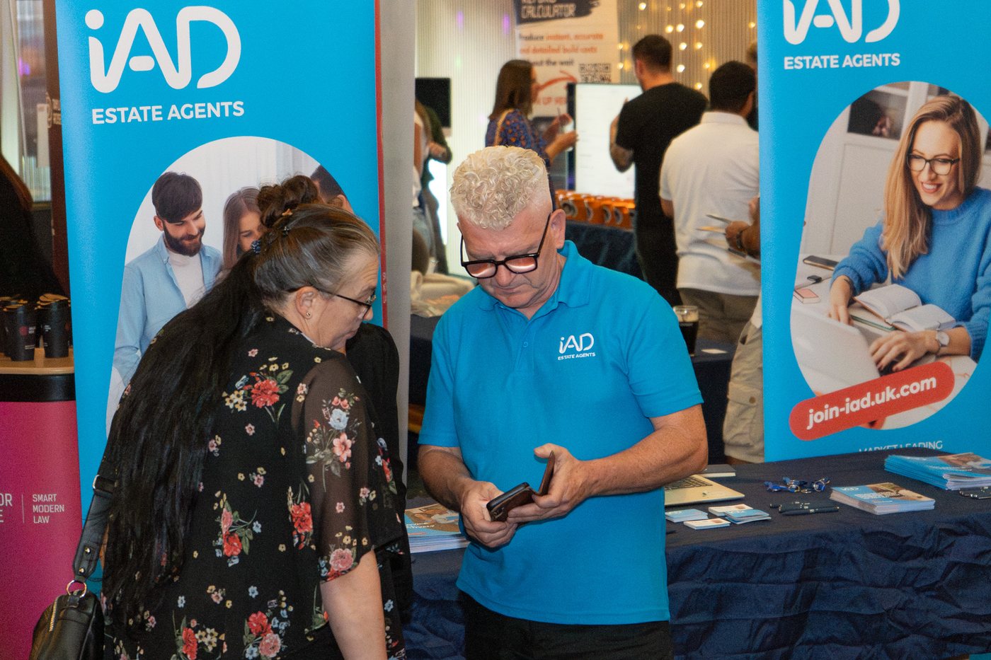 Visitors at the iad estate agents stand at UK Homes Network LIVE Leeds
