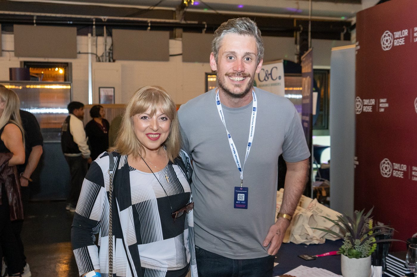 Two guests smiling for the camera at UK Homes Network LIVE Leeds