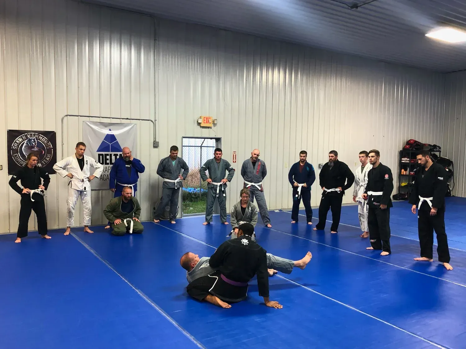 Adult jiu-jitsu class watching a technique demonstration, a drive down SR 37 from Johnstown