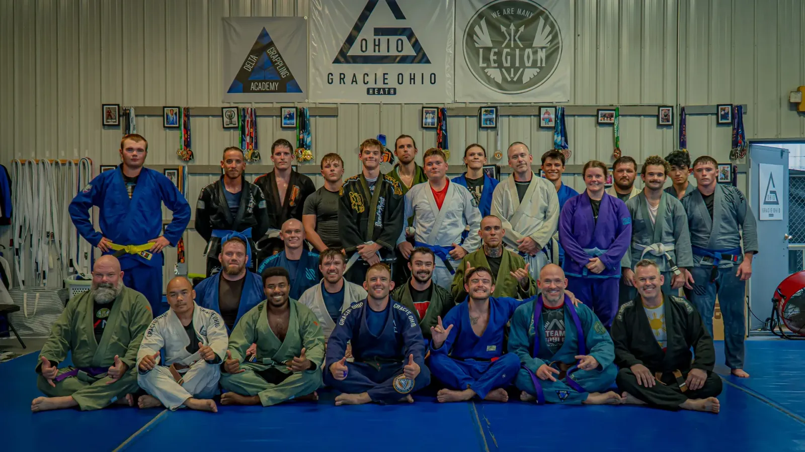 Delta Grappling Academy members under the Gracie Ohio and Legion Project banners